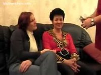 Two MILFs engaged in lesbian sex